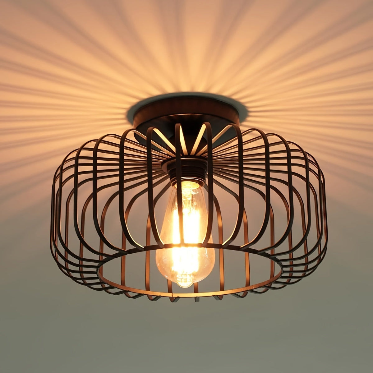 Black ceiling lamp with a round metal shade and E27 socket