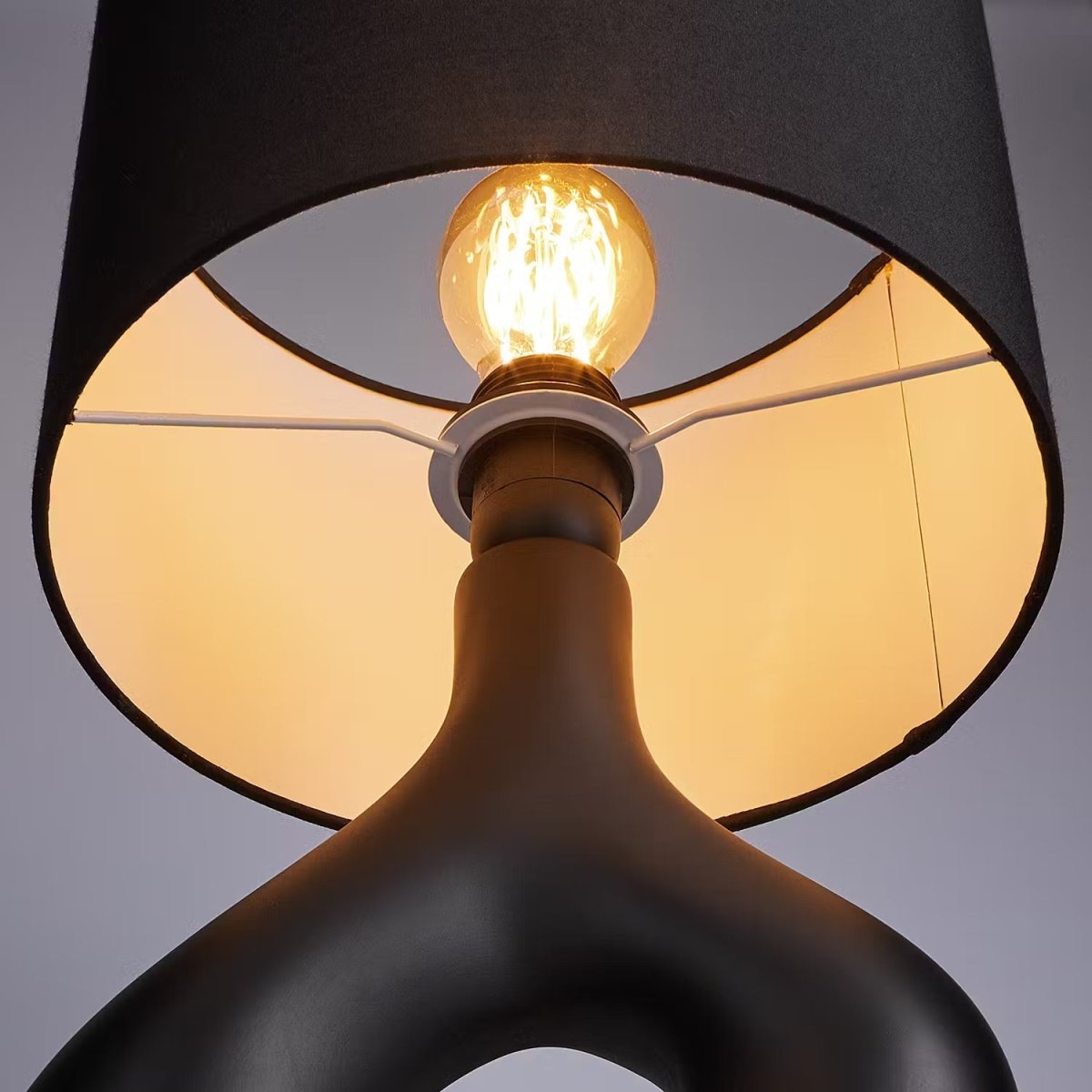 Table lamp with a ceramic base and fabric shade - Industrial design