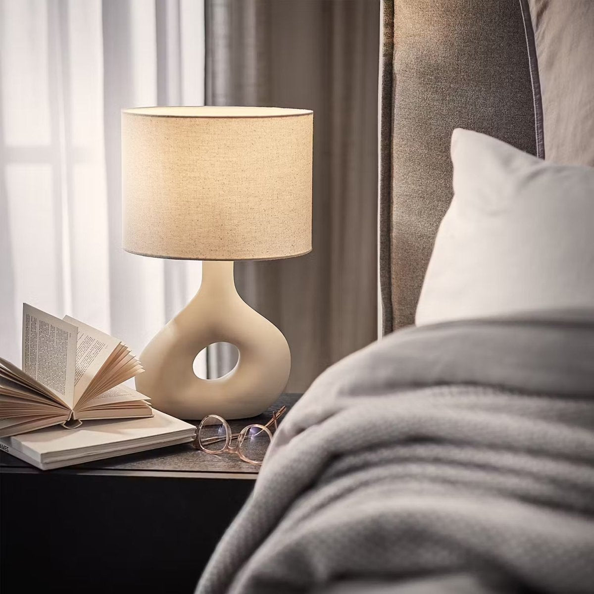 Table lamp with a ceramic base and fabric shade - Industrial design