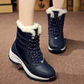 Women's waterproof winter boots with lining and non-slip soles