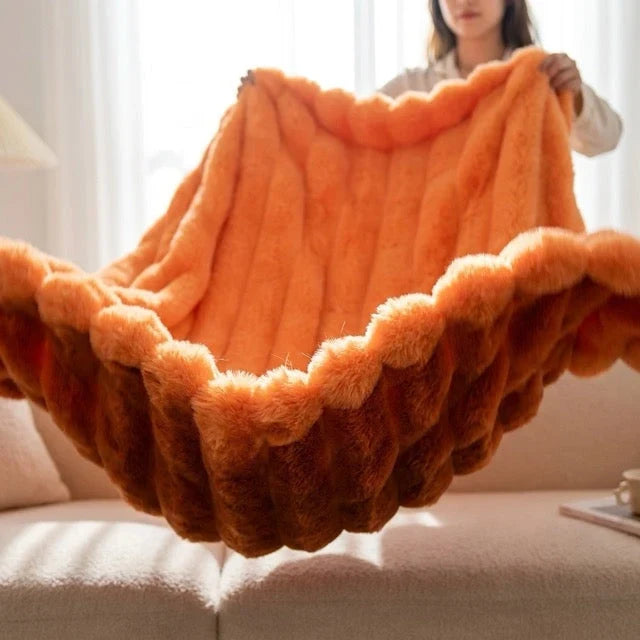 Kunstfell Kuscheldecke in Kaninchenfelloptik – weich und warm