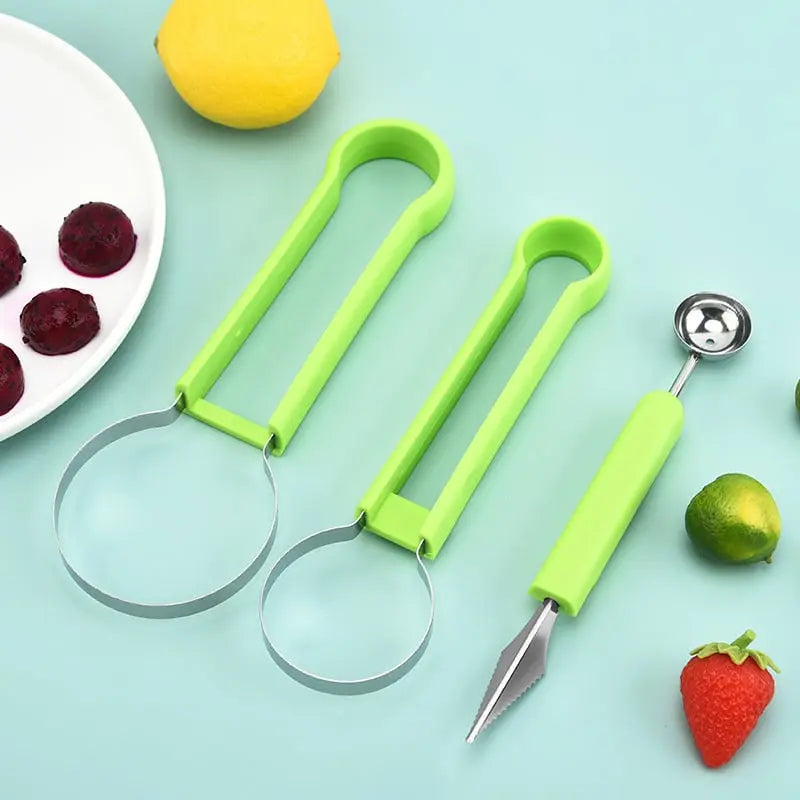 Three-piece 3-in-1 Obstschneider set with fresh fruits on turquoise surface