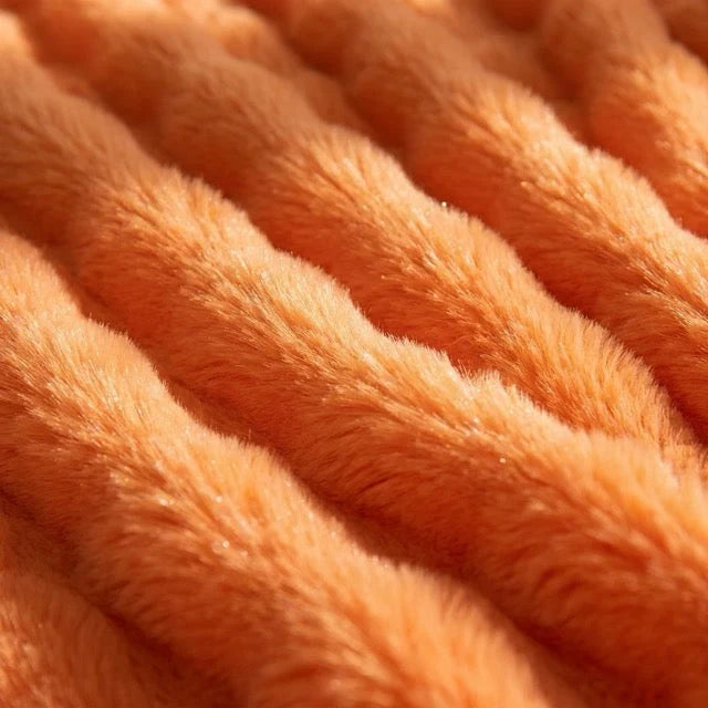 Kunstfell Kuscheldecke in Kaninchenfelloptik – weich und warm