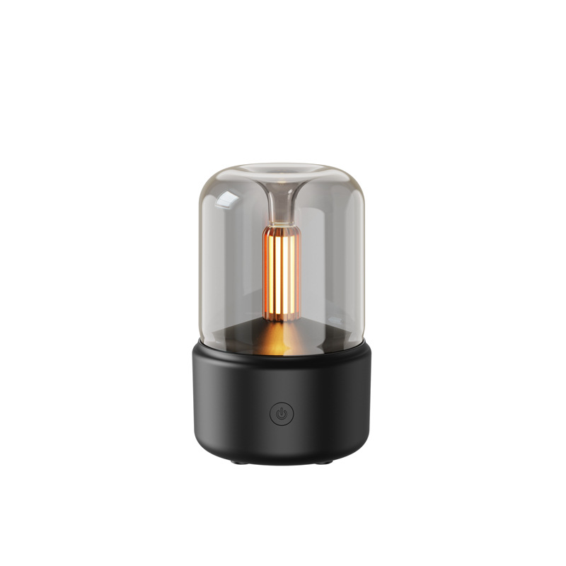 Black base Aroma-Diffusor Nachtlicht with glowing vintage-style LED bulb inside