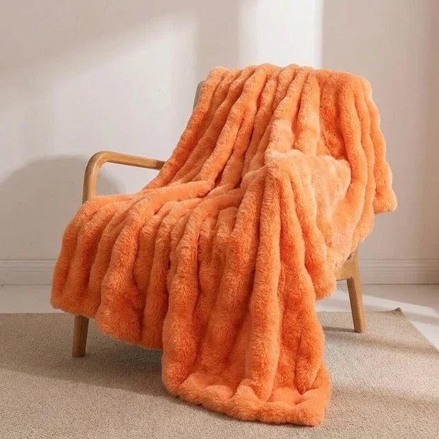 Kunstfell Kuscheldecke in Kaninchenfelloptik – weich und warm