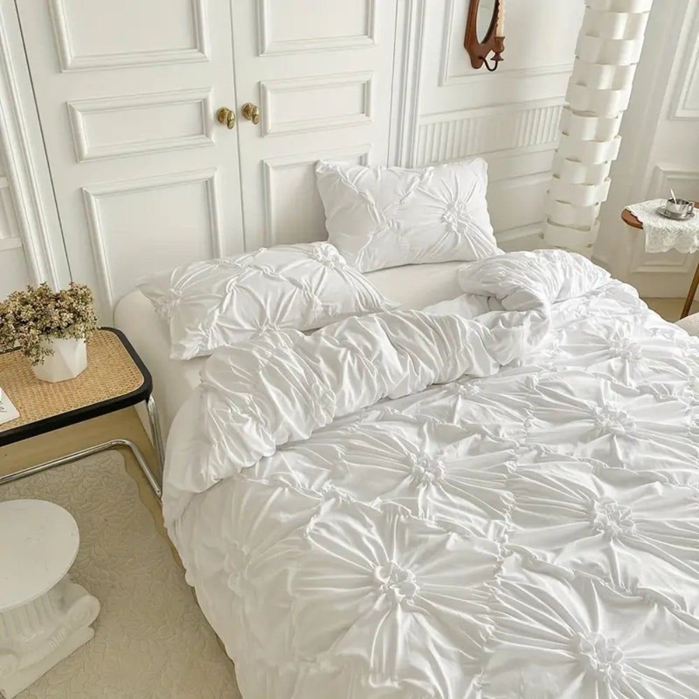 Bedding set with ruffles and floral pattern, including pillowcases