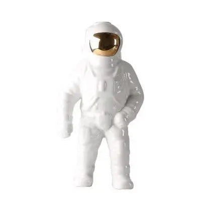 Single white astronauten-figur with golden helmet visor creative decorative piece