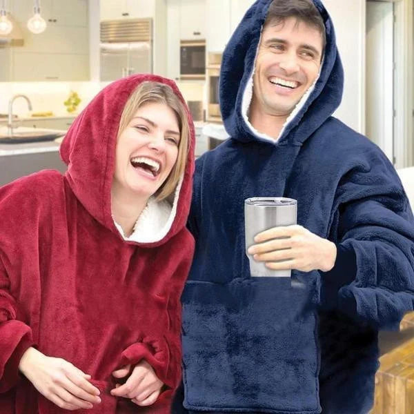Blanket hoodie with fleece lining, hood, and front pocket