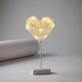 Decorative table lamp made of rattan and copper wire – cordless