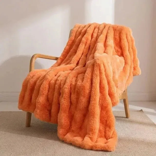 Kunstfell Kuscheldecke in Kaninchenfelloptik – weich und warm
