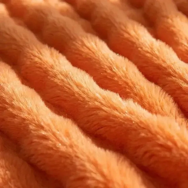 Kunstfell Kuscheldecke in Kaninchenfelloptik – weich und warm