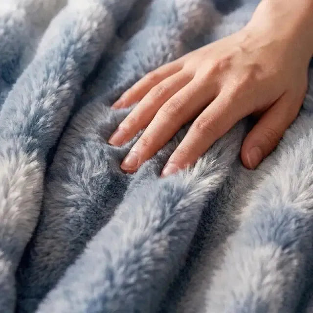 Kunstfell Kuscheldecke in Kaninchenfelloptik – weich und warm