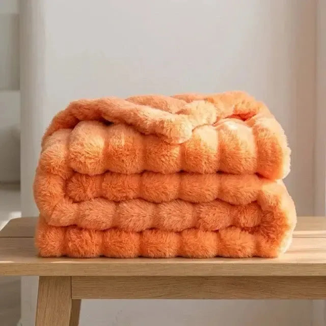 Kunstfell Kuscheldecke in Kaninchenfelloptik – weich und warm