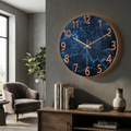 Modern wall clock with illuminated numerals and silent movement