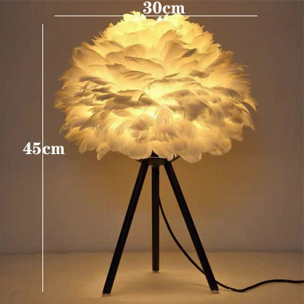 Feather table lamp with gold accents - elegant decorative light