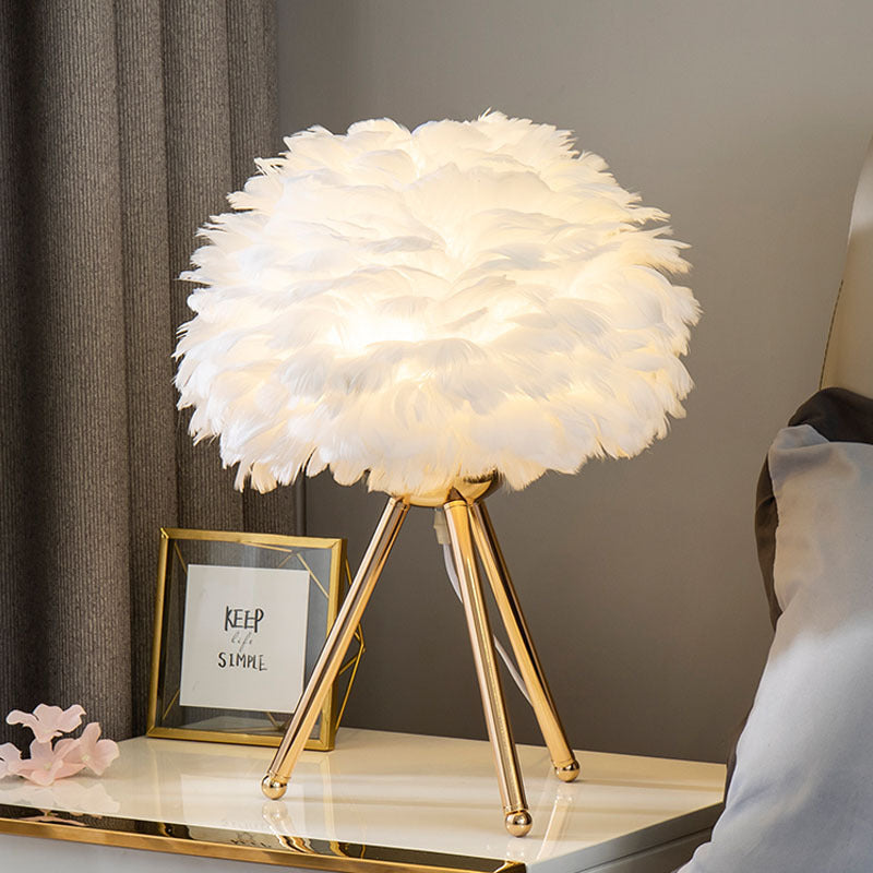 Feather table lamp with gold accents - elegant decorative light