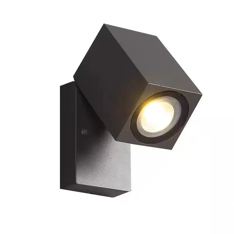 Outdoor wall light with integrated LED and adjustable swing arm