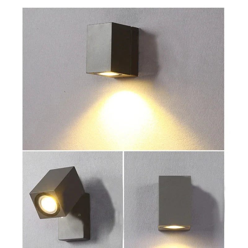 Outdoor wall light with integrated LED and adjustable swing arm