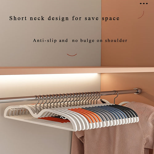 Space-saving non-slip, swivel clothes hangers for more closet space