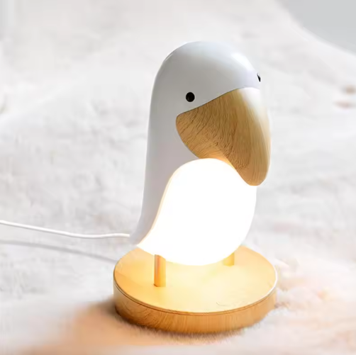 Rechargeable wooden night lamp in a bird design
