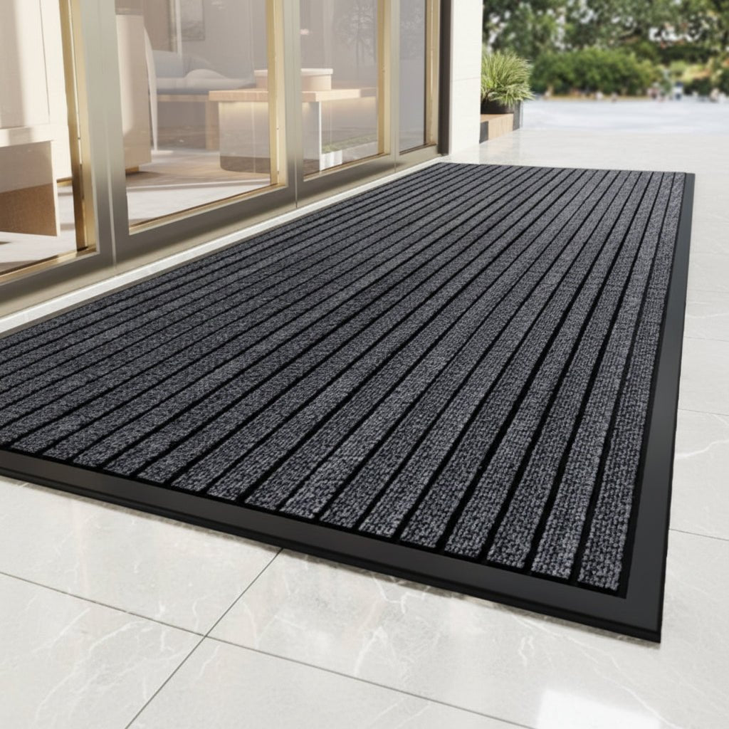 Dirt-trapping mat with non-slip backing for the entryway