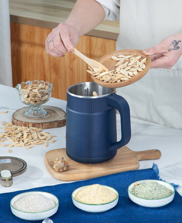 Electric grain mill for flour, seeds and beans