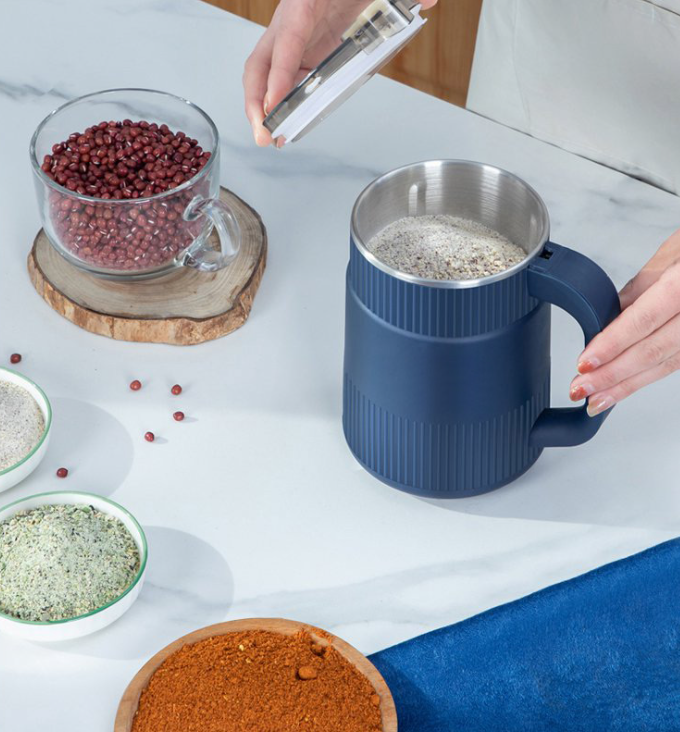 Electric grain mill for flour, seeds and beans