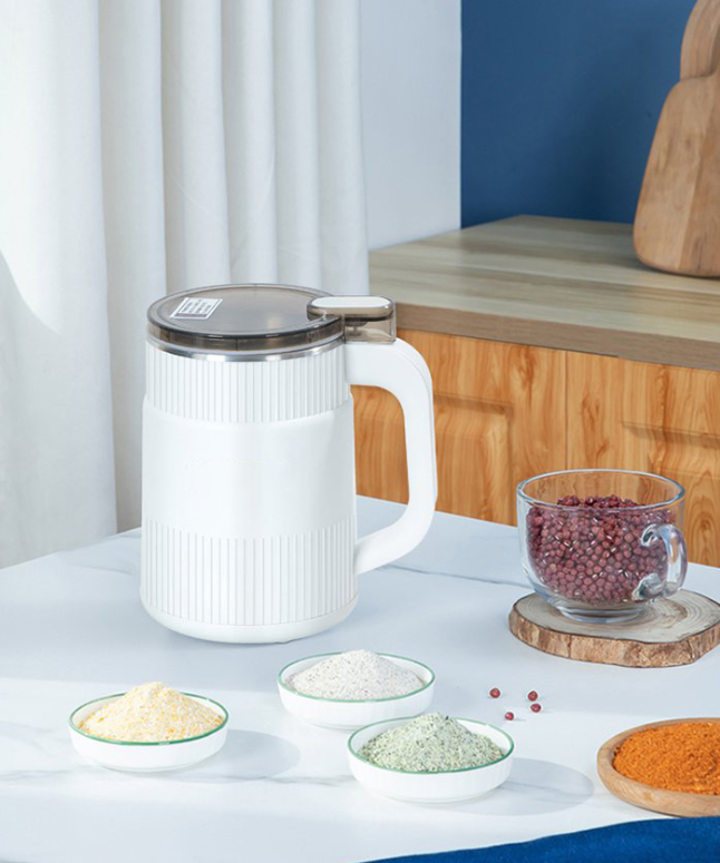 Electric grain mill for flour, seeds and beans