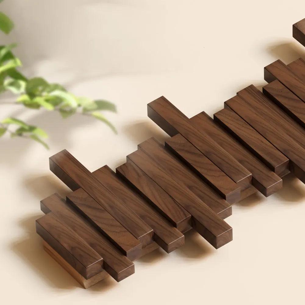 Wall-mounted coat rack with magnetic folding hooks made of wood - modern design