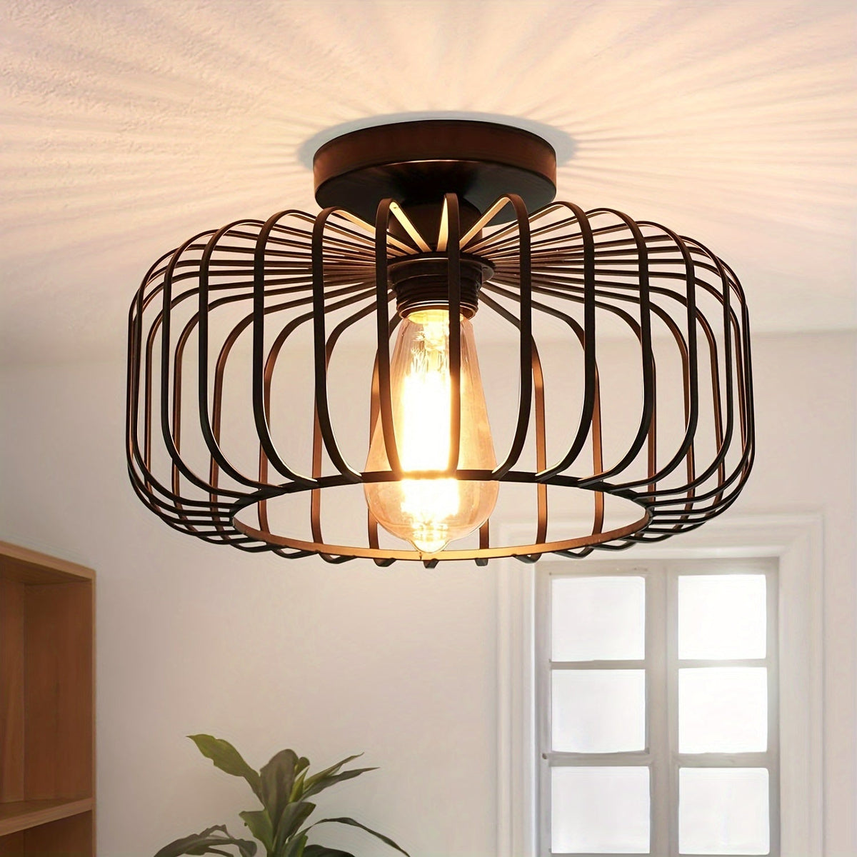 Black ceiling lamp with a round metal shade and E27 socket