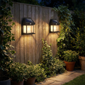 Solar LED wall light with motion sensor for garden and fence