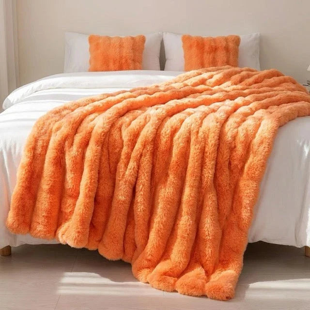 Kunstfell Kuscheldecke in Kaninchenfelloptik – weich und warm