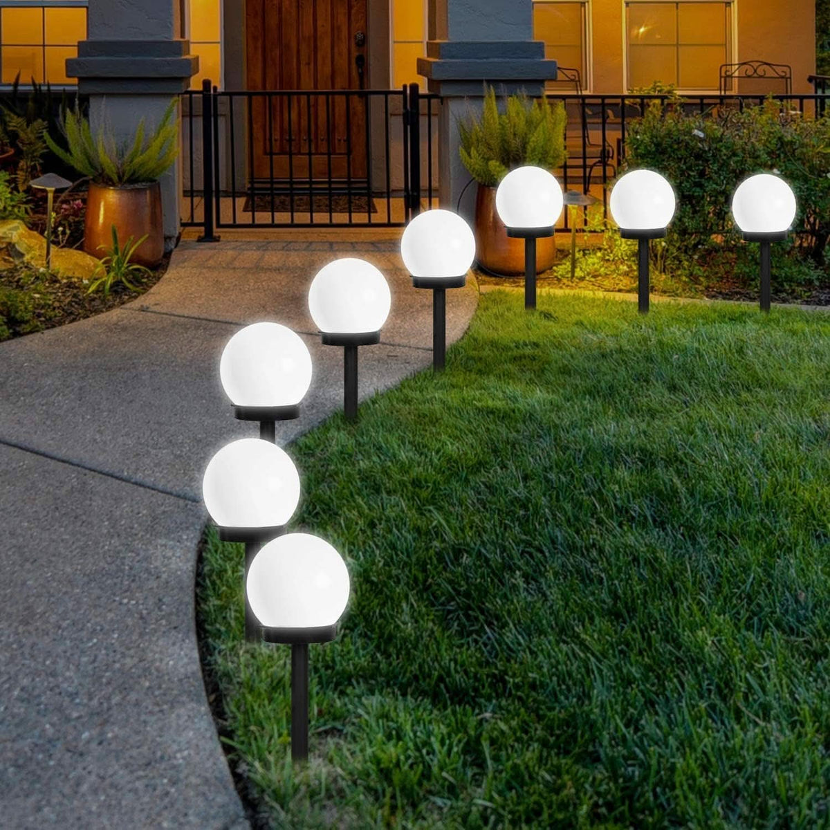 Round LED solar garden light with automatic light control